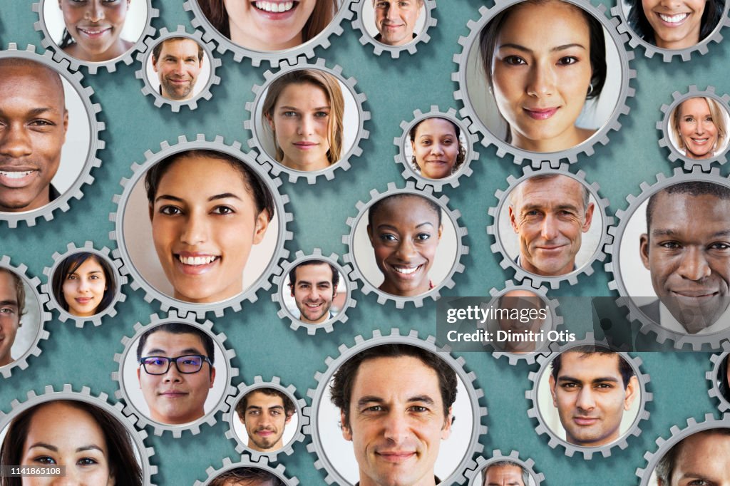 Teamwork Faces On Interlinked Cogs High-Res Stock Photo - Getty Images