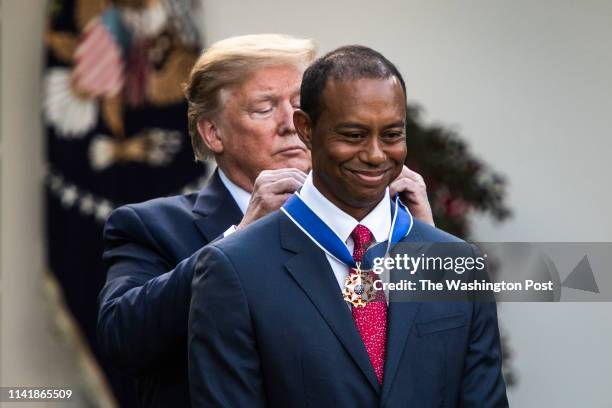 President Donald J. Trump presents the Presidential Medal of Freedom to Eldrick Tiger Woods in the Rose Garden at the White House on Monday, May 06,...