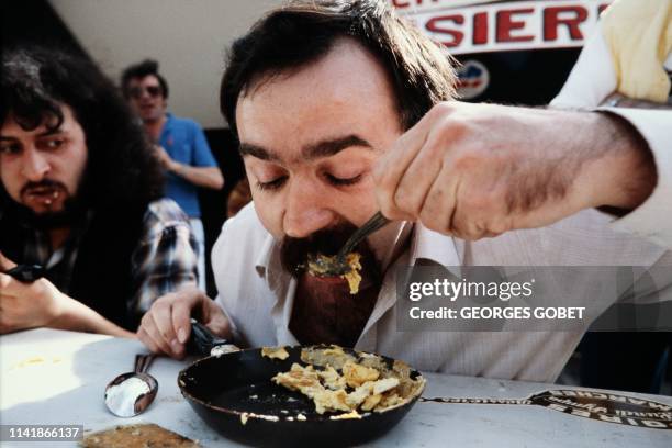 Picture taken on April 12, 1982 at Bessières in Haute-Garonne, south-west of France. The winner of the "Chap Omelette" contest swallowed the...