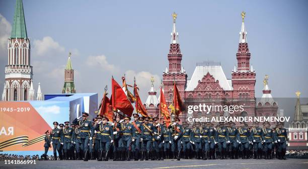 Russian servicemen march along the Red Square in Moscow, on May 7 during a rehearsal for the Victory Day military parade. Russia will celebrate the...