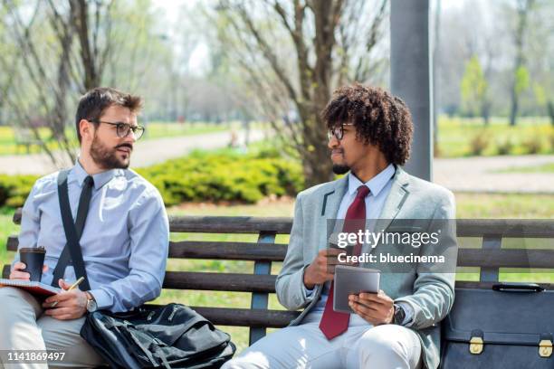 businessmen having a coffee break - coffee break outside stock pictures, royalty-free photos & images