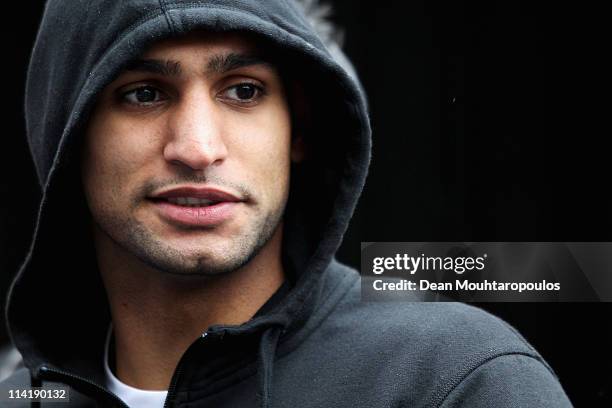Boxer, Amir Khan of England looks on prior to being the Official Starter for the BUPA Great Manchester Run on May 15, 2011 in Manchester, England.