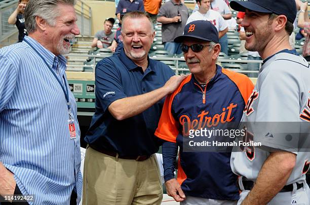 Former pitchers Jack Morris and Bert Blyleven speak with manager Jim Leyland and Justin Verlander of the Detroit Tigers prior to a game between the...