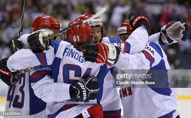 Team members of Russia celebrate their 2nd goal during the IIHF World Championship bronze medal match between Czech Republic and Russia at Orange...