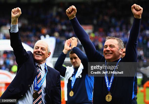 Rangers manager, Walter Smith and Ally McCoist, assistant manager celebrate after winning the Clydesdale Bank Premier League at Rugby Park on May 15,...