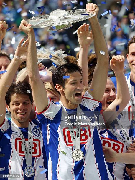 Andre Mijatovic of Berlin celebrates with the trophy winning the championship after the Second Bundesliga match between Hertha BSC Berlin and FC...