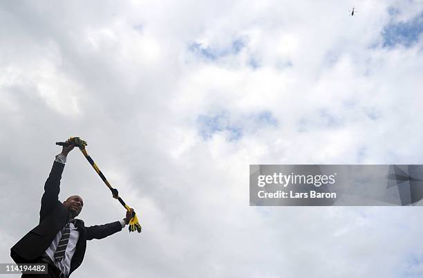 Dede cries during the Borussia Dortmund Bundesliga winners parade at Westfalenhalle on May 15, 2011 in Dortmund, Germany.