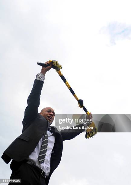 Dede cries during the Borussia Dortmund Bundesliga winners parade at Westfalenhalle on May 15, 2011 in Dortmund, Germany.