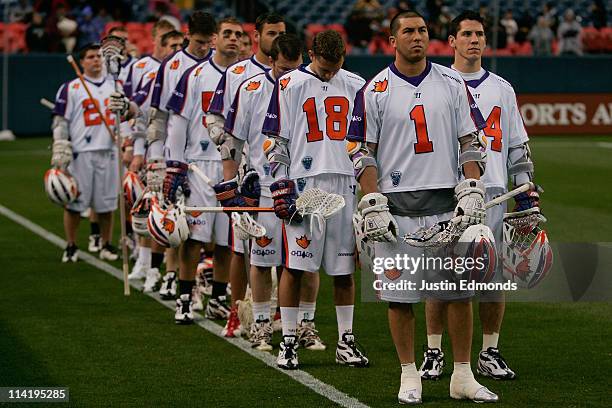 Joe Walters and the rest of the Hamilton Nationals listen to the Canadian National Anthem before taking on the Denver Outlaws at INVESCO Field at...