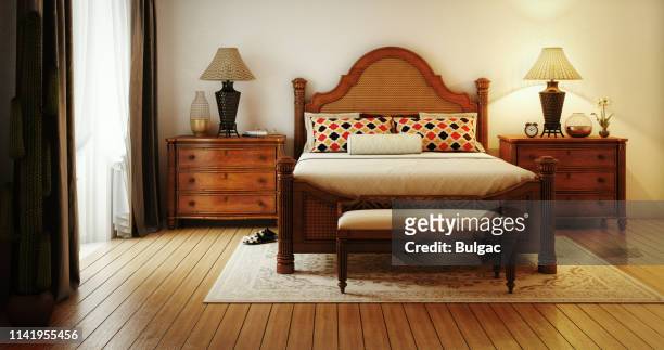 refined caribbean styling master bedroom - headboard stock pictures, royalty-free photos & images