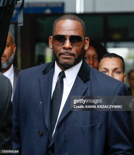 Kelly leaves the Leighton Criminal Court Building after a hearing on sexual abuse charges on May 7, 2019 in Chicago, Illinois. - Kelly is charged...