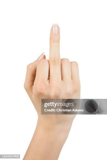 middle finger hand sign - ののしりのジェスチャー ストックフォトと画像