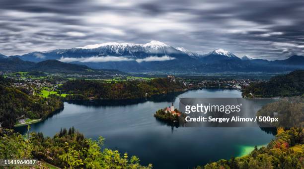 moody bled - triglav slovenia stock pictures, royalty-free photos & images