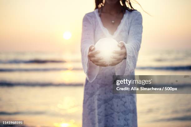 close up moon in woman's hands - midsummer night dream stock pictures, royalty-free photos & images