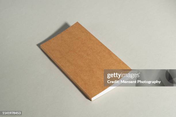 blank magazine book for gray background - libro in brossura foto e immagini stock