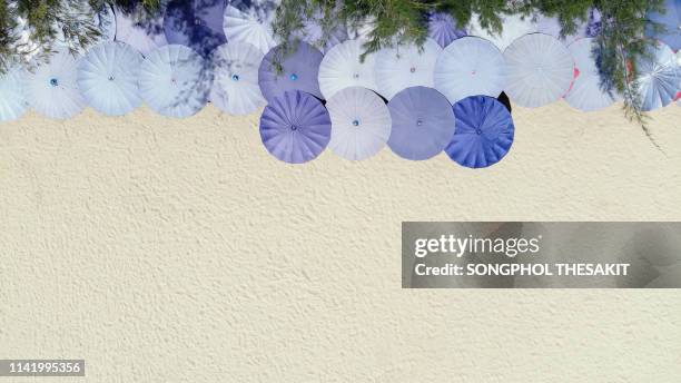 aerial view/many beach umbrellas lined with beautiful beaches by the sea - varna bulgaria stock pictures, royalty-free photos & images