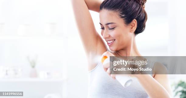 this will leave me smelling fresh all day - deodorant stock pictures, royalty-free photos & images