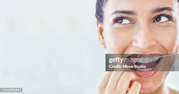 take better care of your teeth - dental floss stock pictures, royalty-free photos & images