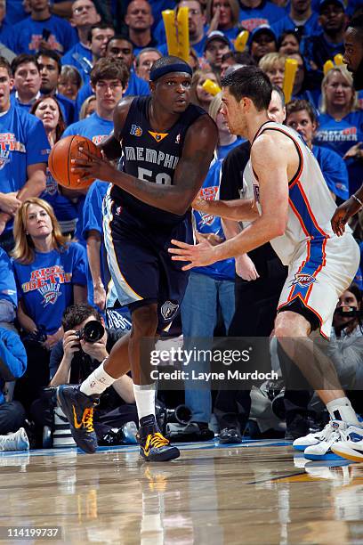 Zach Randolph of the Memphis Grizzlies controls the ball against Nick Collison of the Oklahoma City Thunder in Game Seven of the Western Conference...