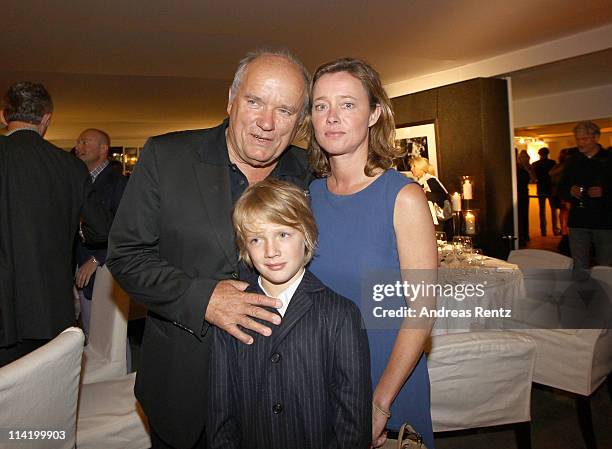 Peter Lindbergh with his son Joseph and his wife Petra attend the IWC Presents Peter Lindbergh Exhibition during the 64th Cannes Film Festival on May...