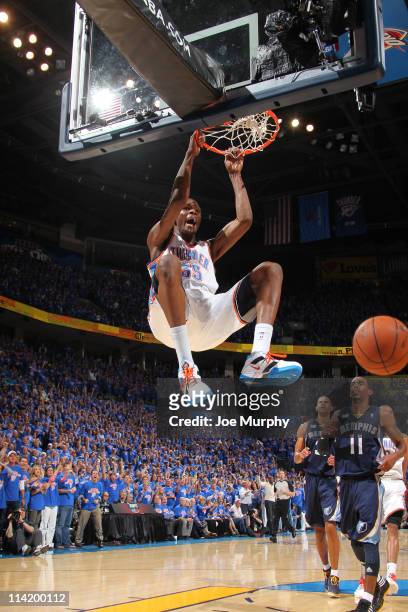 Kevin Durant of the Oklahoma City Thunder dunks against the Memphis Grizzlies during Game Seven of the Western Conference Semifinals in the 2011 NBA...
