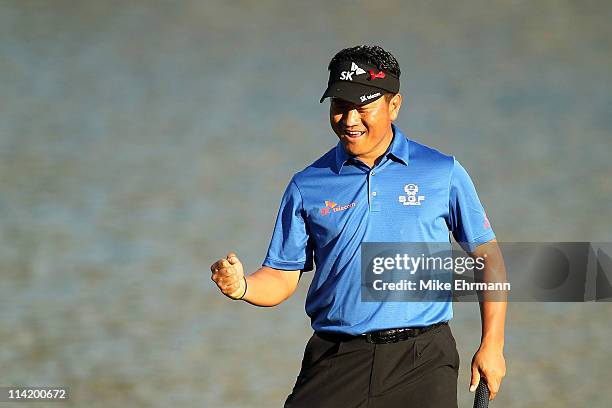 Choi of South Korea celebrates making birdie on the 17th hole during the final round of THE PLAYERS Championship held at THE PLAYERS Stadium course...