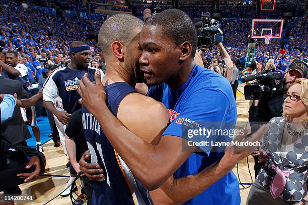 Kevin Durant of the Oklahoma City Thunder receives congratulations from Shane Battier of the Memphis Grizzlies after Game Seven of the Western...