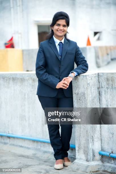 full length portrait of young woman in business suit,  attractive indian businesswoman. - full suit ストックフォトと画像