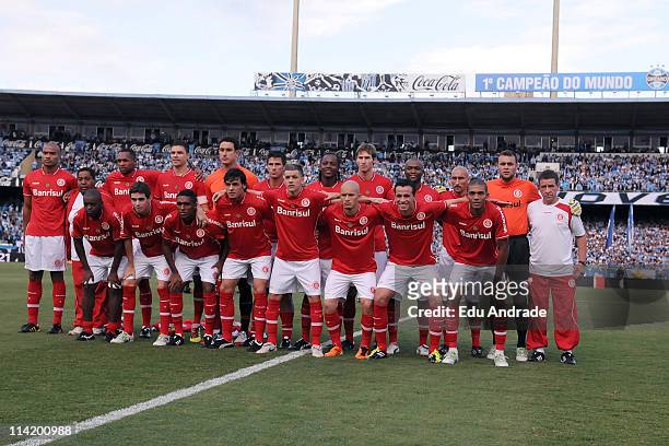 Players of Internacional poses at the beginning of a match againts Gremio of the Rio Grande do Sul State Championship at Olimpico stadium on May 15,...