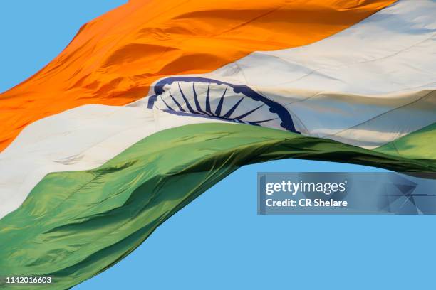 close-up shot of wavy indian flag - indian politics and governance fotografías e imágenes de stock
