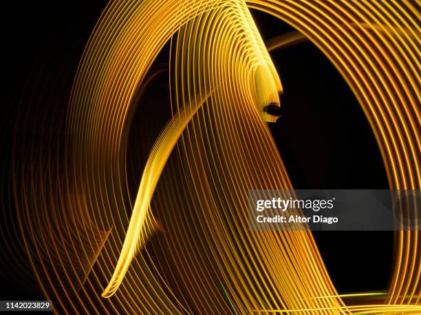futuristic gold lines. shape of  female figure with eyes - woman's eyelashes - lord line stock-fotos und bilder