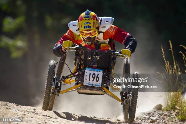 off-road wheelchair racer - paraplegic race stock pictures, royalty-free photos & images