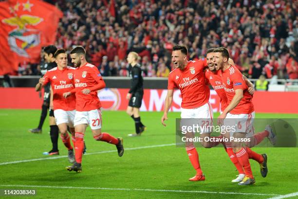 Ruben Dias of Benfica celebrates with teammates after scoring their team's third goal during the UEFA Europa League Quarter Final First Leg match...