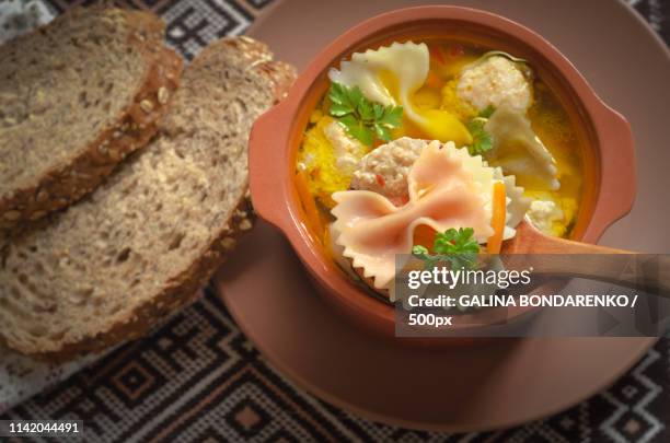 italian soup, on the old boards - italian meatball soup stock pictures, royalty-free photos & images