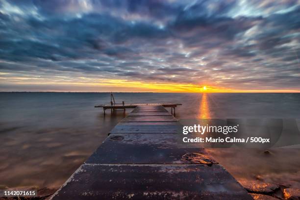 sunrise ijsselmeer - mario calma stockfoto's en -beelden