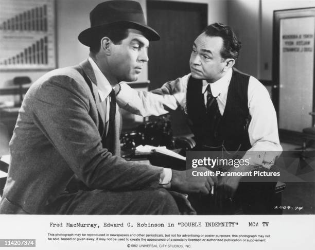 Fred MacMurray and Edward G Robinson in a still from 'Double Indemnity', directed by Billy Wilder, 1944.