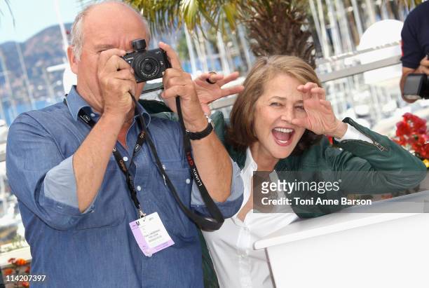 Actors Peter Lindbergh and Charlotte Rampling attend "The Look" Photocall during the 64th Annual Cannes Film Festival at Palais des Festivals on May...