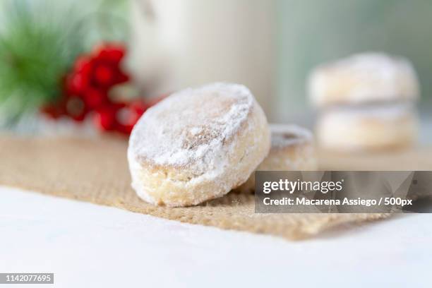 polvorones close-up christmas spanish sweets and a mugtif - polvorón photos et images de collection