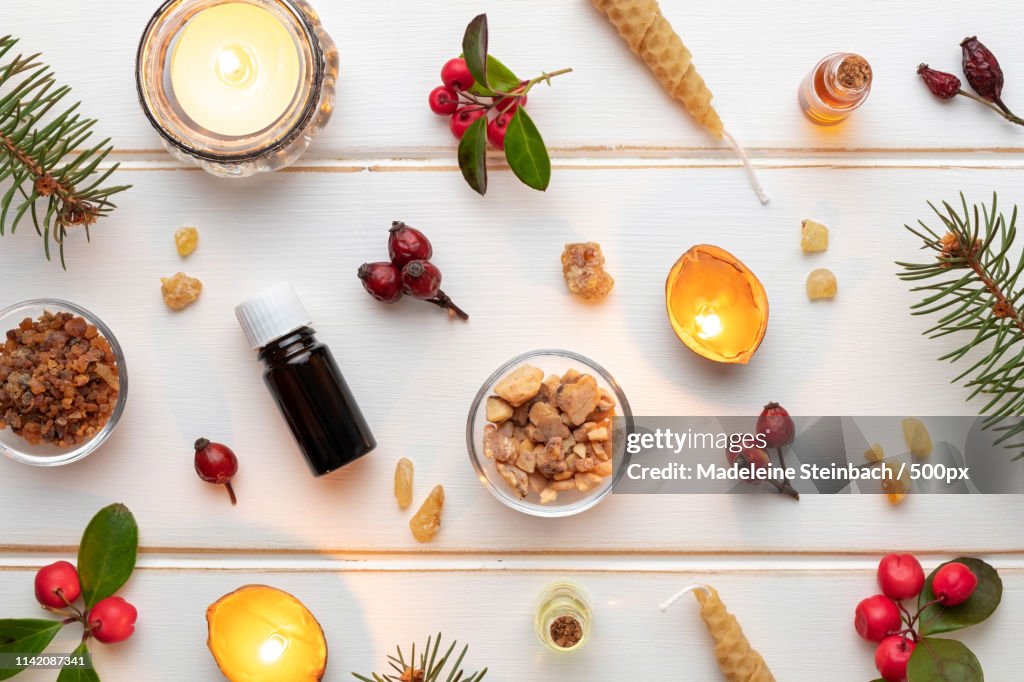 Christmas Background With Essential Oil Bottles