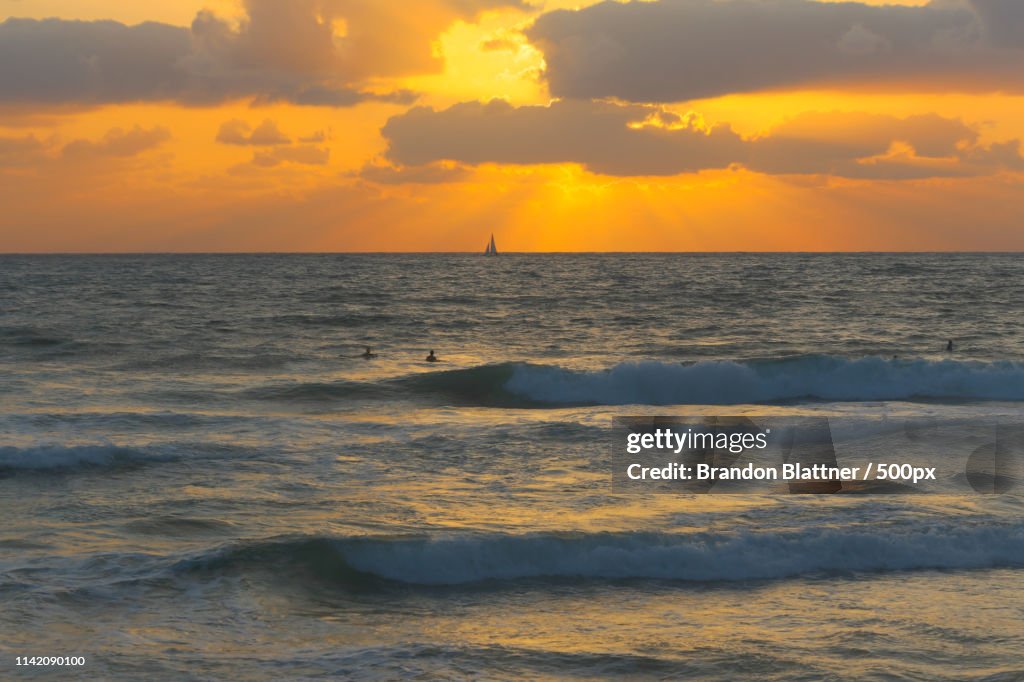 Scenic view of sea at sunset