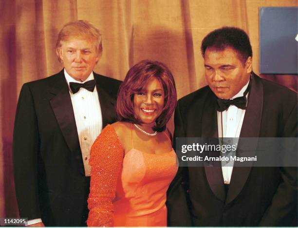 Donald Trump, Mary Wilson and the legendary heavyweight champ Muhammad Ali pose March 14, 2001 in New York City. Ali was honored at the 46th Annual...