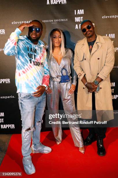 Singer Gims, his wife Demdem and Football player Djibril Cisse attend the "I am not a Rapper" : Capsule Collection Launch Party Photocall on April...