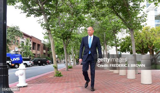 Attorney Michael Avenatti makes his way to an awaiting vehicle after addressing the media outside the Santa Ana federal courthouse in Santa Ana,...