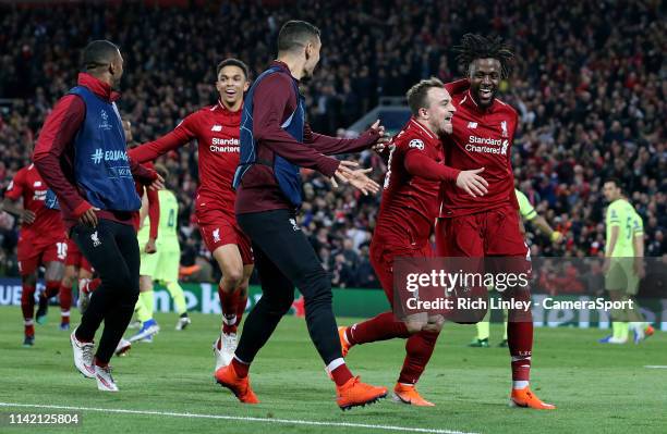 Liverpool's Divock Origi celebrates with Xherdan Shaqiri after scoring his side's fourth goal during the UEFA Champions League Semi Final second leg...