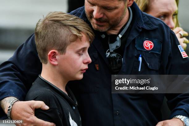 Students are reunited with their parents after being evacuated to the Recreation Center at Northridge after at least seven students were injured...