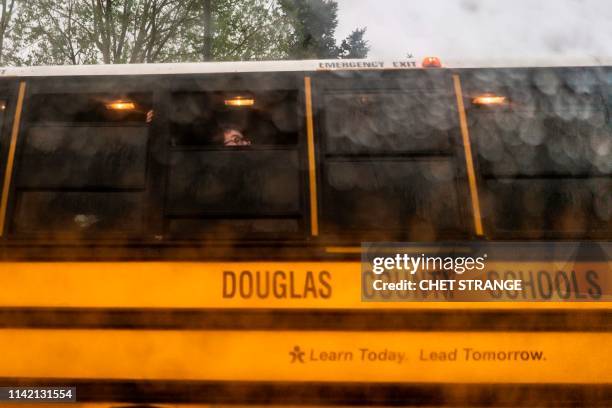 Students are evacuated from the Recreation Center at Northridge in Highlands Ranch after a shooting at the STEM School Highlands Ranch, Colorado on...