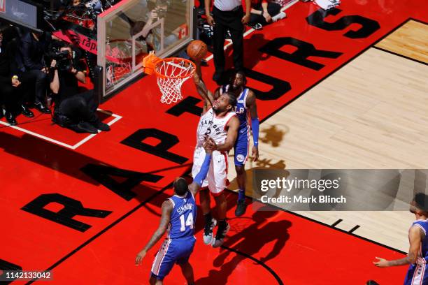 Kawhi Leonard of the Toronto Raptors dunks the ball during the game against the Philadelphia 76ers during Game Five of the Eastern Conference...