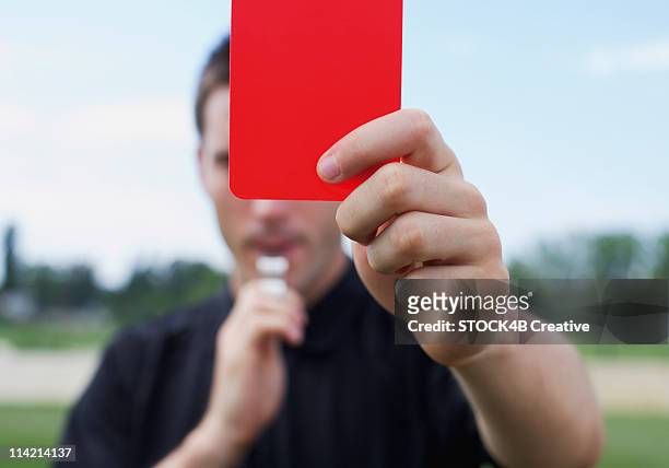 referee showing red card - red card stock pictures, royalty-free photos & images