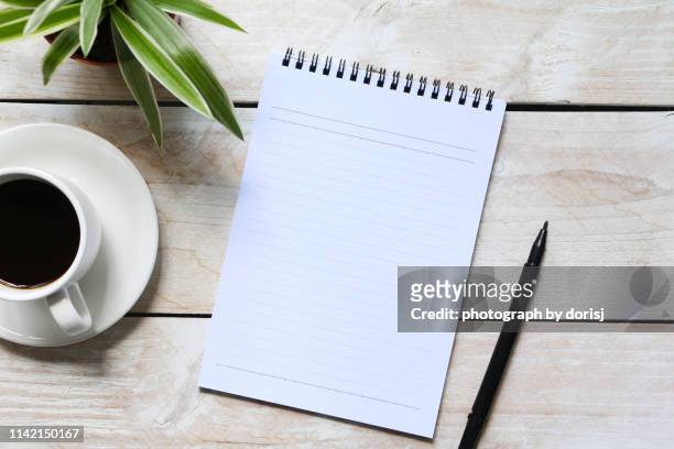 blank note pad - magazine table stock pictures, royalty-free photos & images
