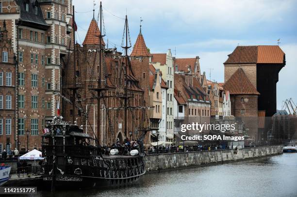 Wooden ship carrying tourists seen operating on Motlawa river at the old town. Gdansk is a port city located of the Baltic coast of Poland. In 2018,...